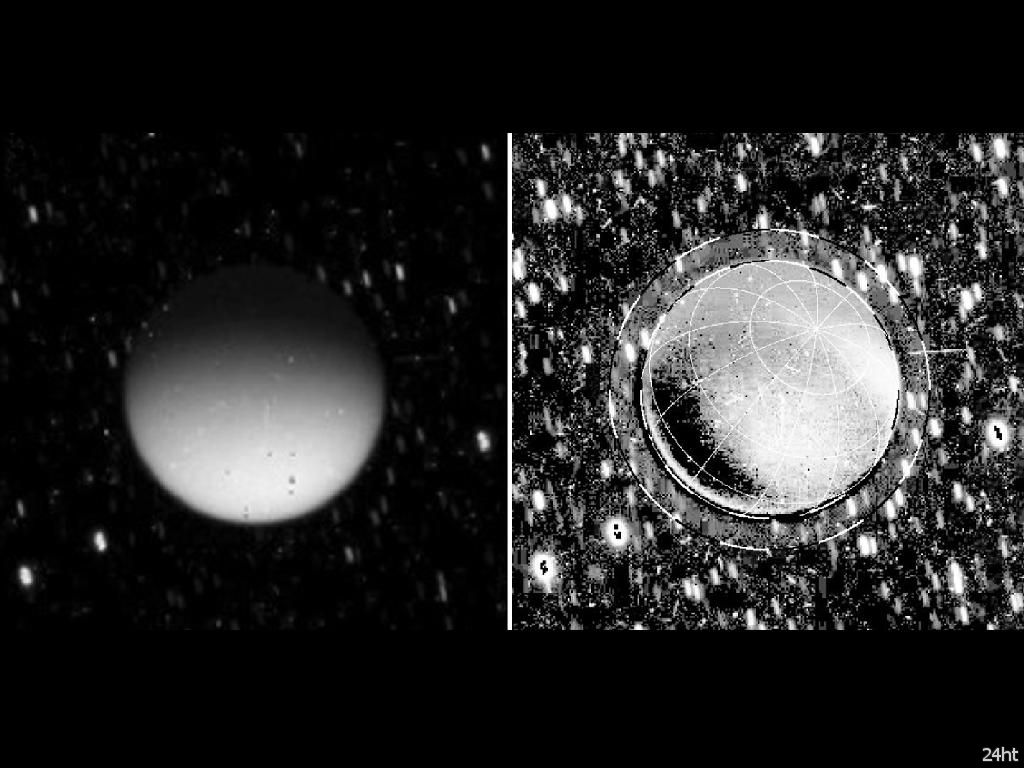 Самая большая луна Сатурна, Титан, светится в темноте