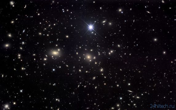 Обнаружен галактический кластер богатый темной материей